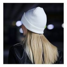Load the image into the gallery viewer, Women's plain beanie hat for winter in white color.