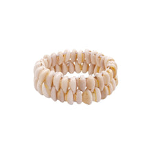 Load the image into the gallery viewer, Wide stretch bracelet made of natural cowrie shells for women in Ibiza and boho style.