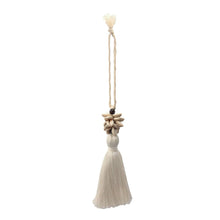 Load the image into the gallery viewer, Handmade macrame bag charm in Boho and Ibiza style with cowrie shells and tassel.