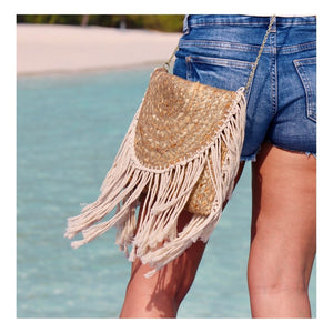 Vegan shoulder bag, clutch made of jute. Organic bag made of natural fibers in Boho and Ibiza style with macramé fringes and golden shimmer.